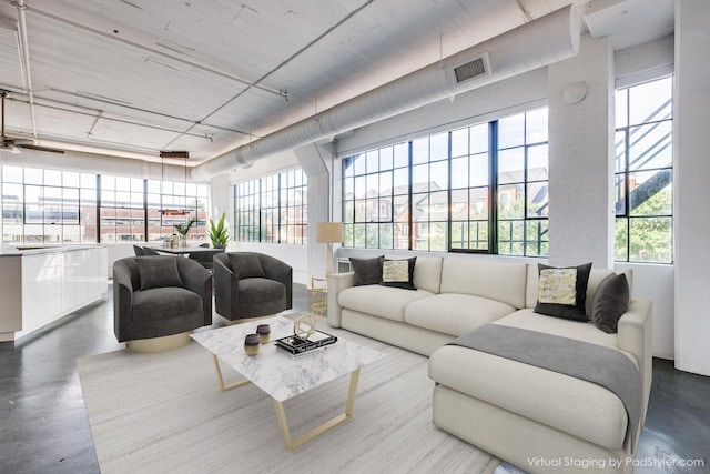 living room with concrete floors