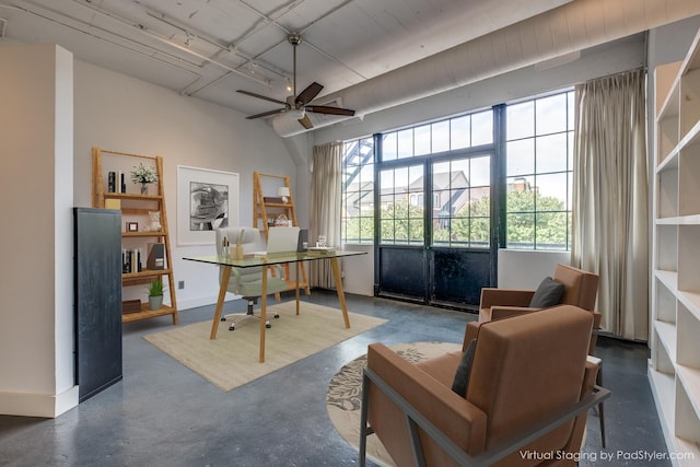 home office featuring ceiling fan and a healthy amount of sunlight