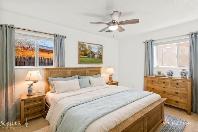 carpeted bedroom featuring ceiling fan