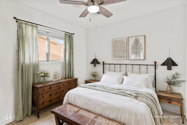 bedroom featuring ceiling fan and carpet flooring