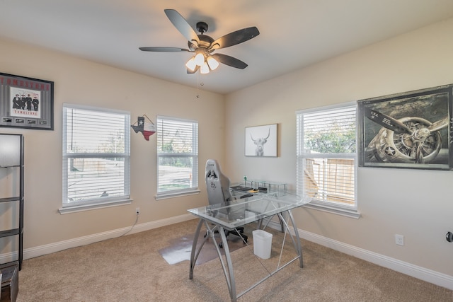 office area with light carpet and ceiling fan