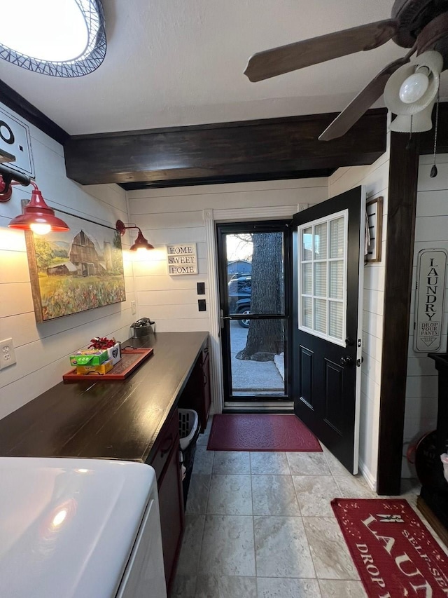 208 Cedar Ln, Burleson, TX 76028 - entrance foyer featuring a ceiling fan and wood walls