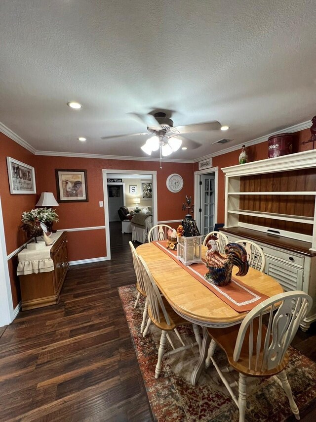 208 Cedar Ln, Burleson, TX 76028 - dining area featuring dark wood-type flooring, ornamental molding, a textured ceiling, ceiling fan, and recessed lighting