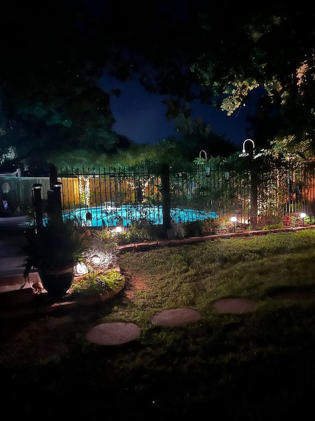 208 Cedar Ln, Burleson, TX 76028 - view of yard at twilight