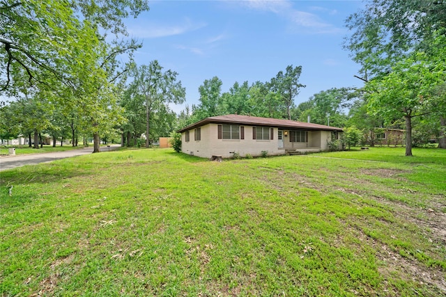 view of property exterior featuring a yard