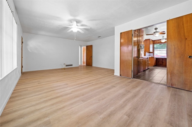 empty room featuring light hardwood / wood-style floors