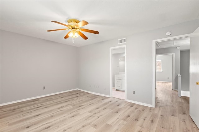 unfurnished bedroom with ceiling fan, light hardwood / wood-style floors, connected bathroom, and a closet