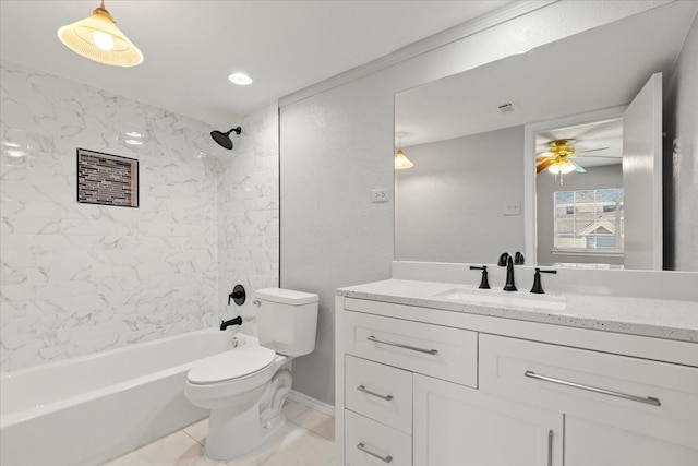 full bathroom with tiled shower / bath combo, ceiling fan, toilet, and vanity