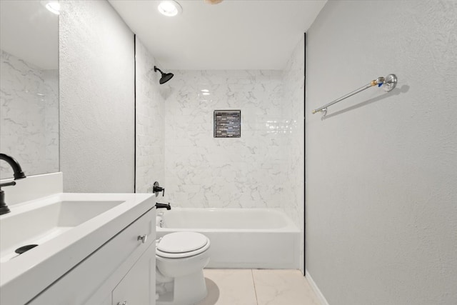 full bathroom featuring vanity, tiled shower / bath combo, and toilet