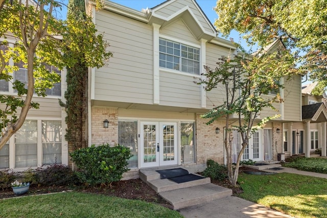 view of property with french doors