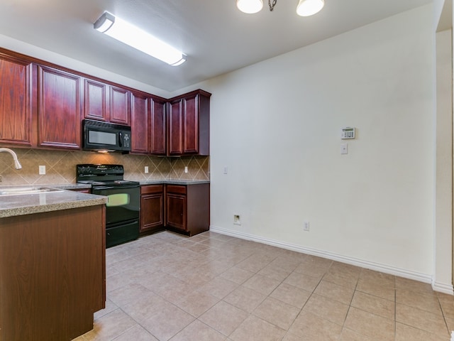 kitchen with black appliances, decorative backsplash, light tile patterned flooring, and sink