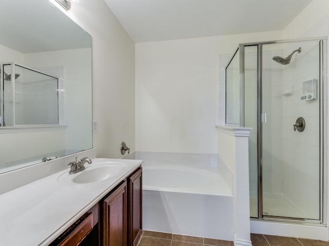 bathroom featuring tile patterned flooring, vanity, and independent shower and bath