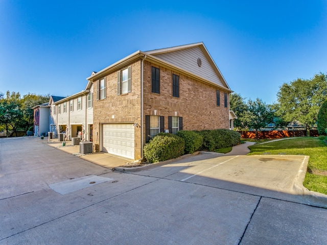 view of side of property featuring a garage