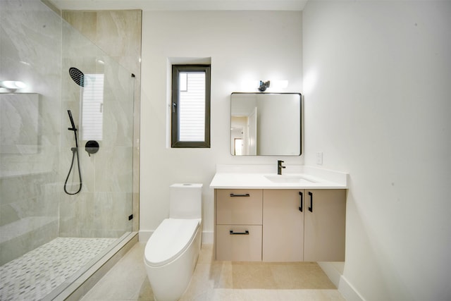 bathroom with tile patterned flooring, toilet, a tile shower, and vanity