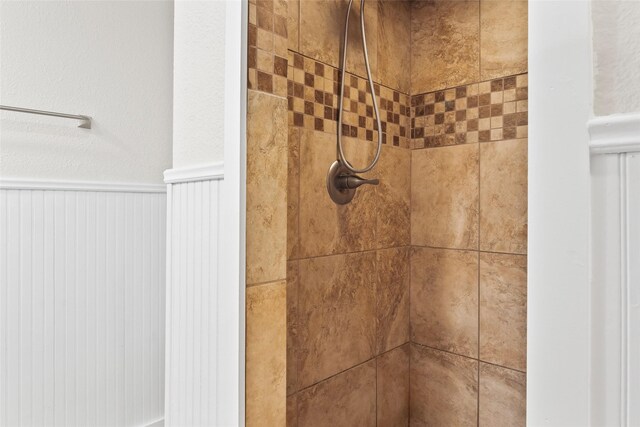 room details with a tile shower