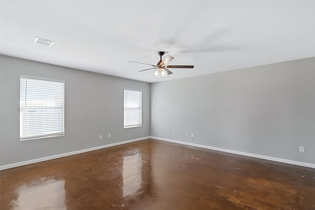 spare room featuring ceiling fan