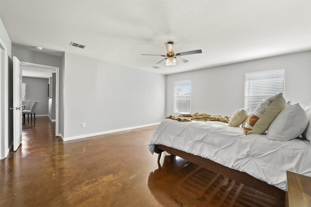 unfurnished room with ceiling fan