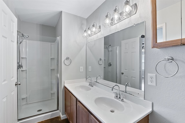 bathroom with vanity and walk in shower