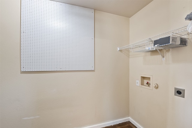 laundry room with wood-type flooring, washer hookup, and hookup for an electric dryer