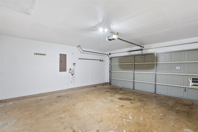 garage featuring electric panel and a garage door opener