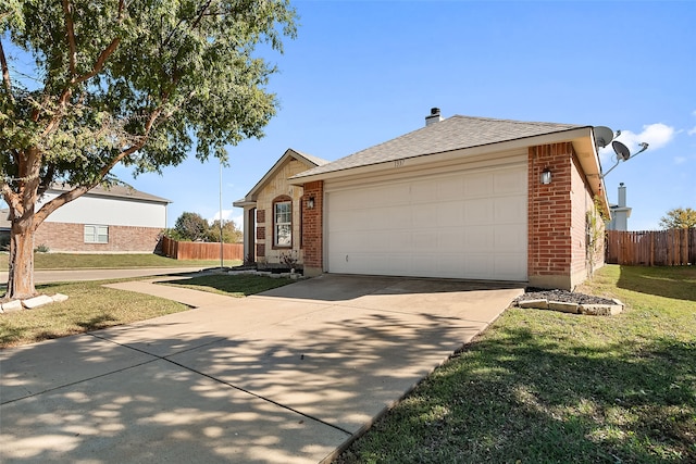 single story home featuring a front yard and a garage