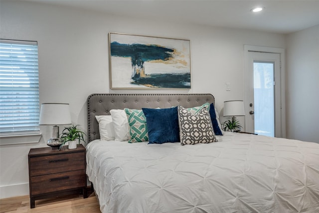 bedroom featuring wood-type flooring