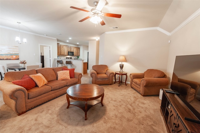 carpeted living room with crown molding, ceiling fan with notable chandelier, and lofted ceiling