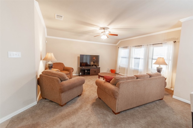 living room featuring lofted ceiling, carpet floors, ceiling fan, and ornamental molding