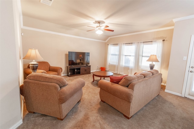 carpeted living room featuring ceiling fan, lofted ceiling, and ornamental molding