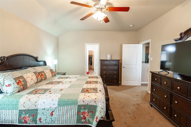 carpeted bedroom with ceiling fan and lofted ceiling