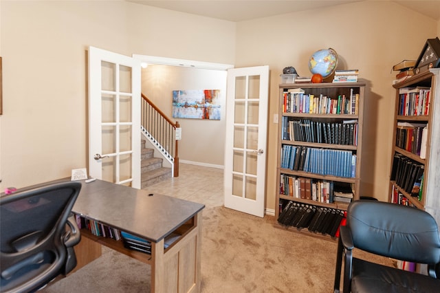 office featuring light carpet and french doors