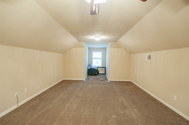 bonus room with carpet and lofted ceiling