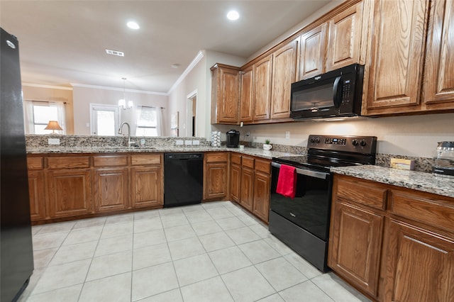 kitchen featuring black appliances, crown molding, sink, light stone countertops, and a notable chandelier