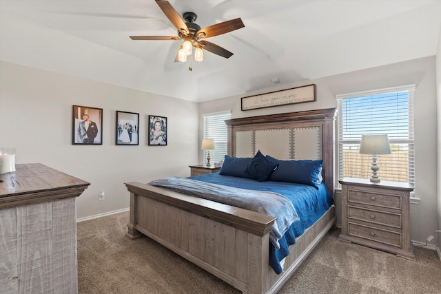 bedroom featuring light colored carpet and ceiling fan