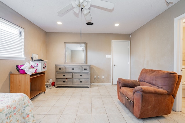 bedroom featuring a ceiling fan, light tile patterned floors, recessed lighting, and baseboards