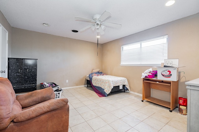 bedroom featuring light tile patterned flooring, recessed lighting, a ceiling fan, and baseboards