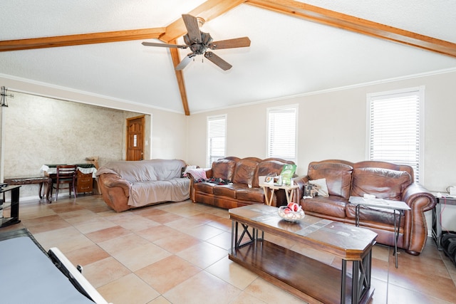 living room with lofted ceiling with beams, crown molding, and ceiling fan