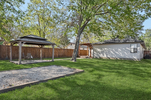 view of yard featuring a gazebo, a patio, and central AC