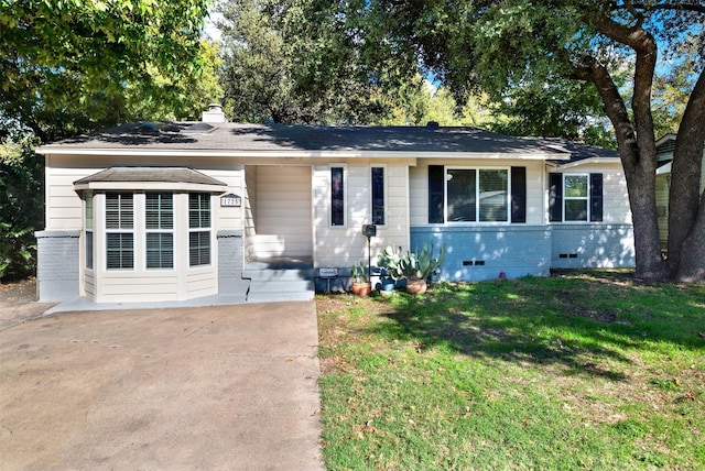 1725 Brake Dr, Carrollton, TX 75006 - view of front facade with brick siding, a front lawn, a chimney, and crawl space