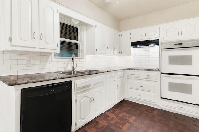 1725 Brake Dr, Carrollton, TX 75006 - kitchen featuring black appliances, under cabinet range hood, decorative backsplash, white cabinets, and dark stone countertops