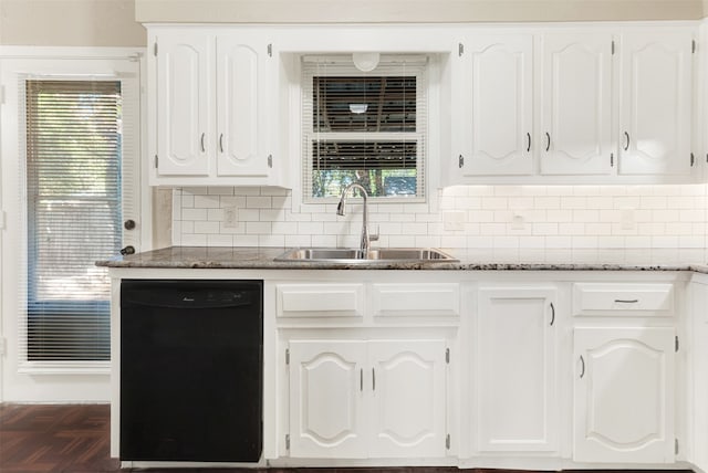 kitchen with white cabinets, a healthy amount of sunlight, and black dishwasher