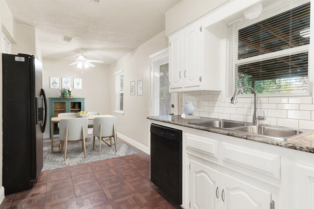 kitchen featuring backsplash, black appliances, white cabinets, sink, and ceiling fan