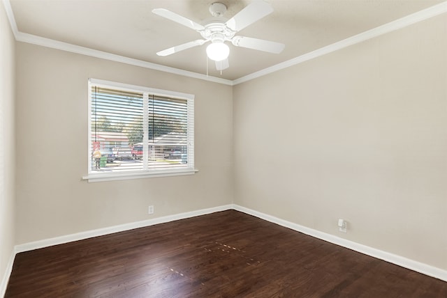 empty room featuring dark hardwood / wood-style flooring, ceiling fan, and ornamental molding