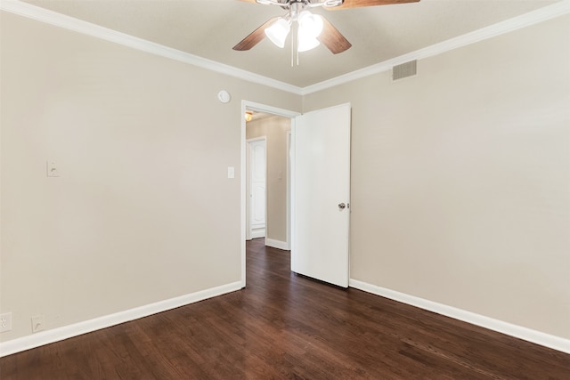 unfurnished room featuring dark hardwood / wood-style floors, ceiling fan, and ornamental molding