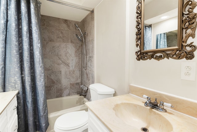 full bathroom featuring vanity, toilet, and shower / tub combo with curtain