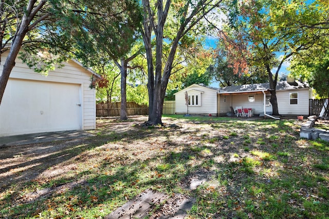 view of yard featuring a garage