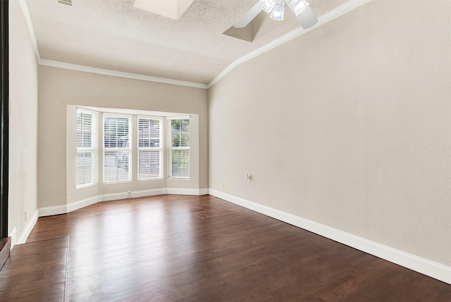 1725 Brake Dr, Carrollton, TX 75006 - spare room featuring dark wood-type flooring, a textured ceiling, crown molding, and a ceiling fan