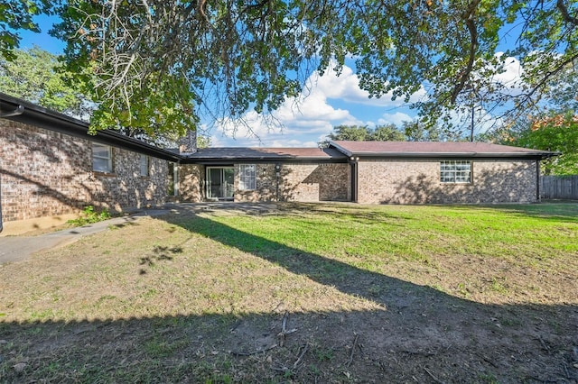 exterior space featuring a lawn