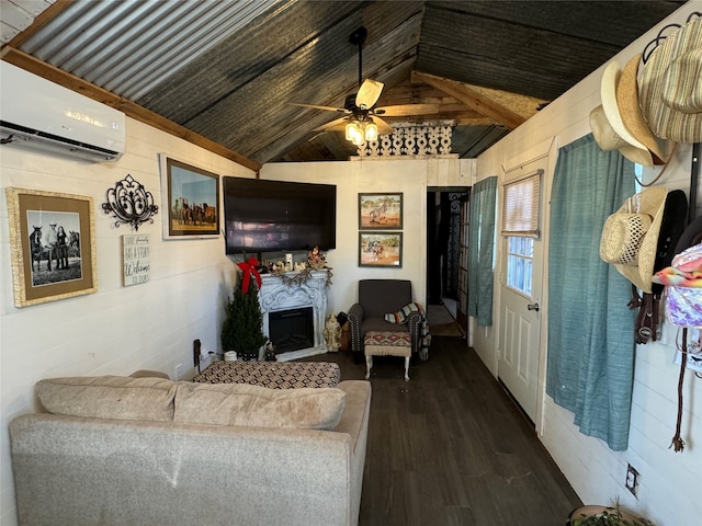 living room featuring a wall mounted air conditioner, wood walls, lofted ceiling, dark hardwood / wood-style floors, and ceiling fan