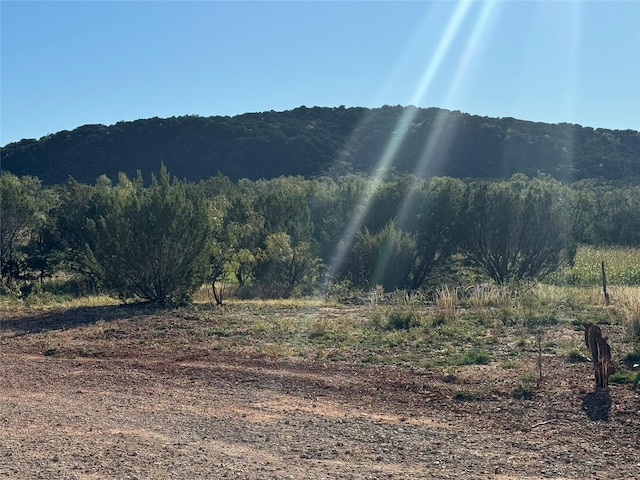 view of mountain feature featuring a rural view